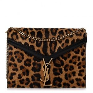 Perfect condition YSL leopard print bag never worn with original tag